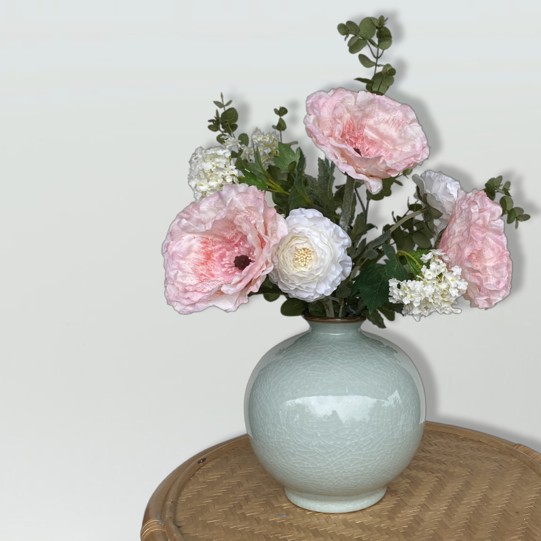 Poppies in jade green vase