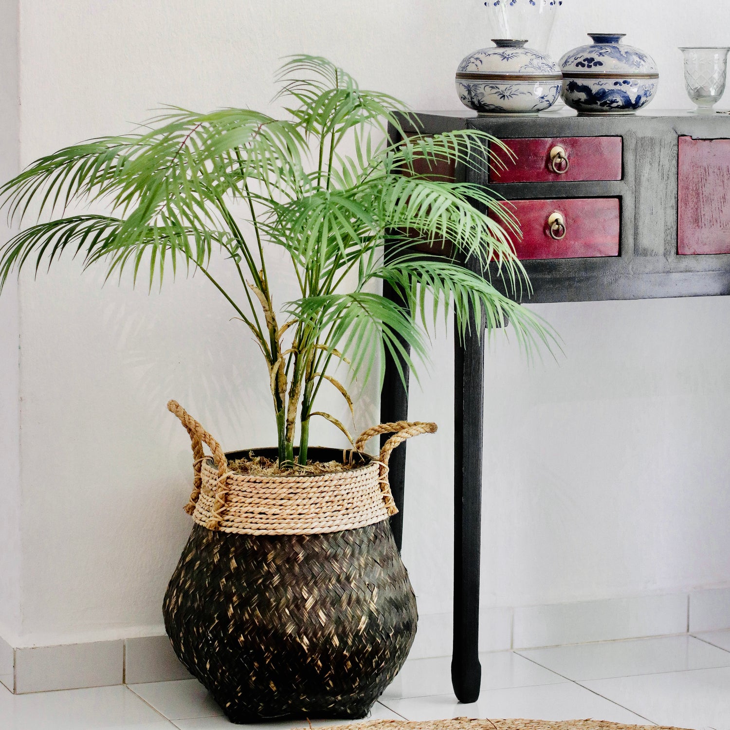 Artificial palm plant in basket