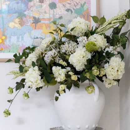 Green and white artificial flowers